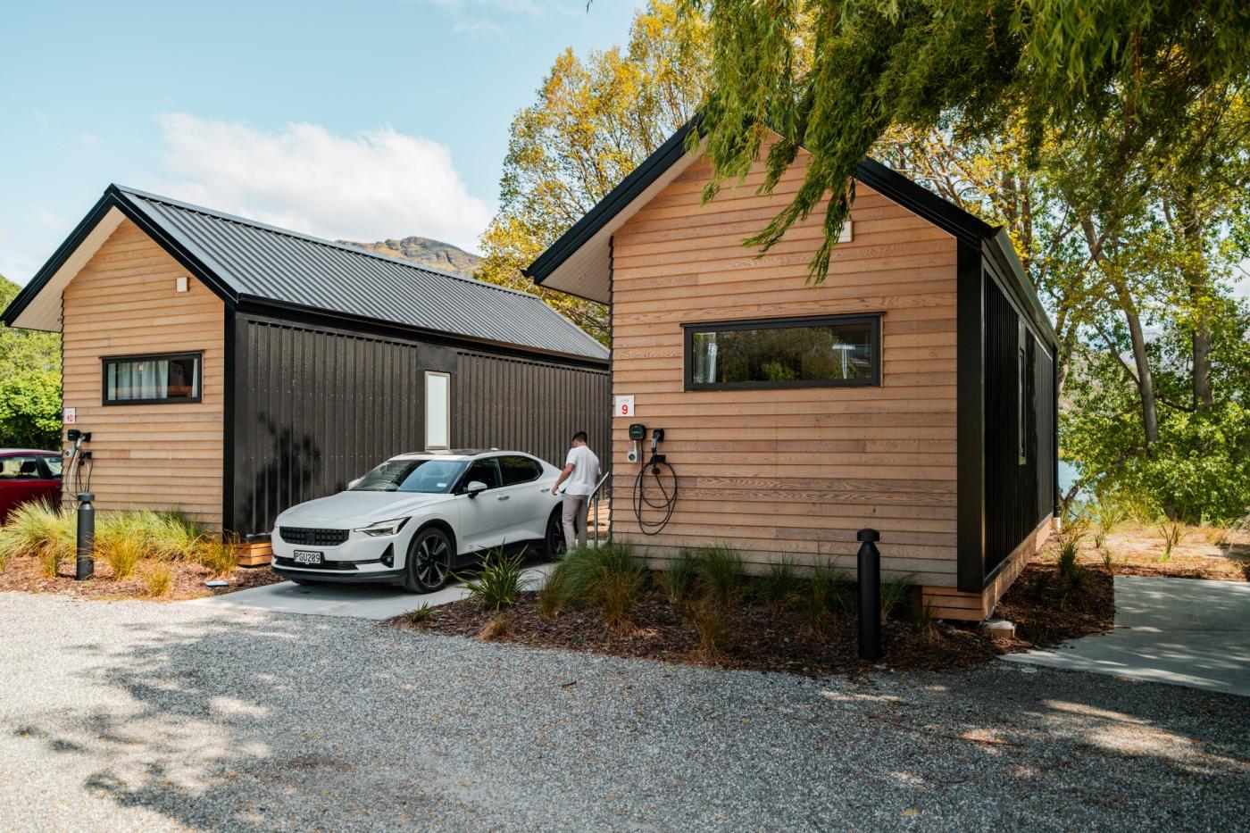 Electric vehicle on charge at cabin at Driftaway Holiday Park in Frankton, Queenstown