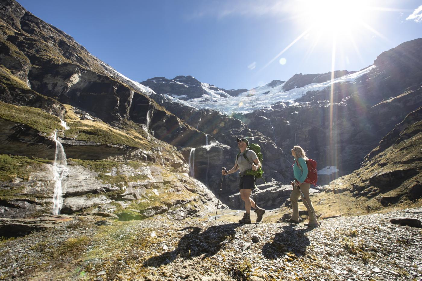 Couple hiking Earnslaw Burn in Summer