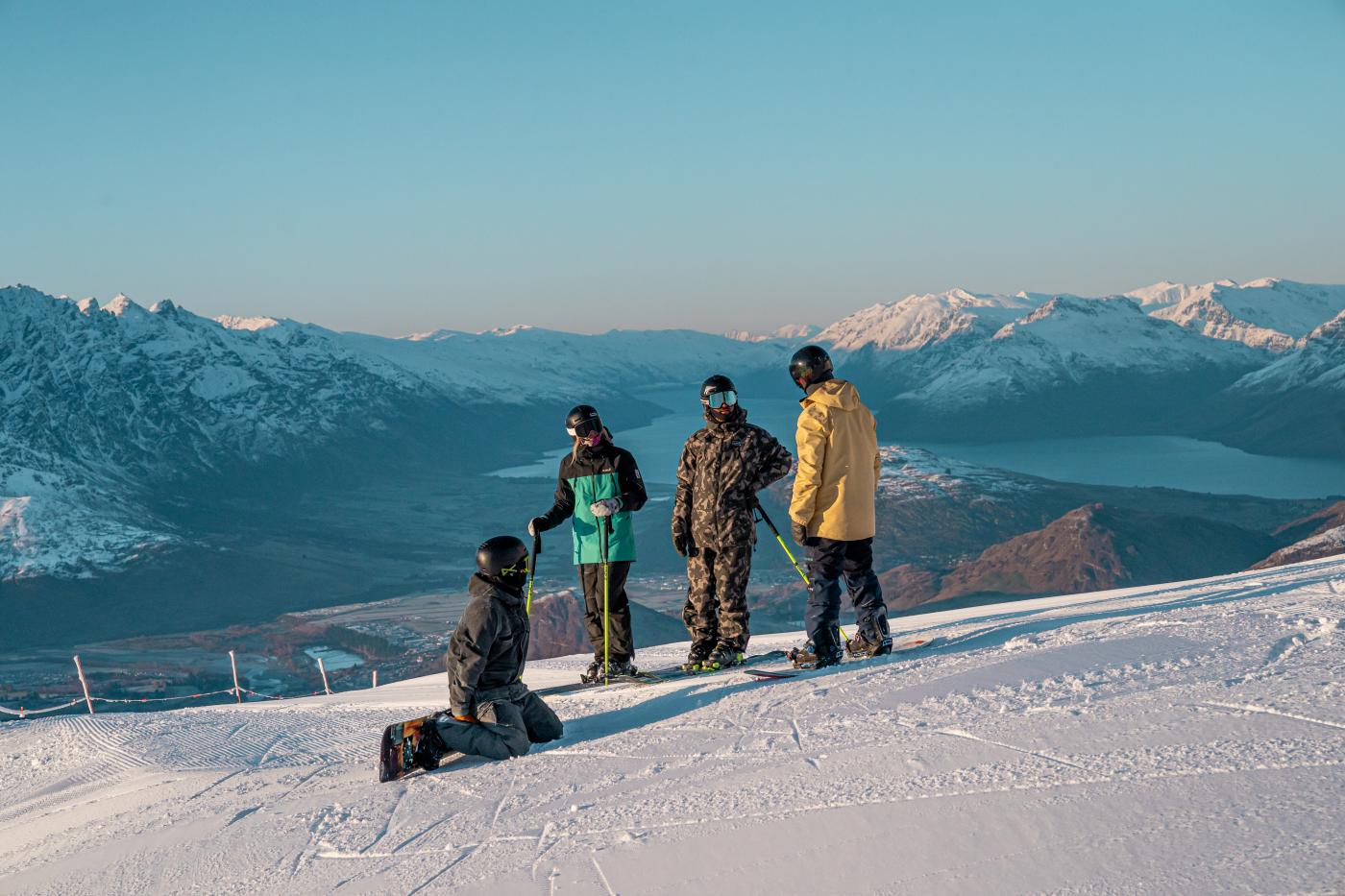 Snowboarders and skiers at Coronet Peak