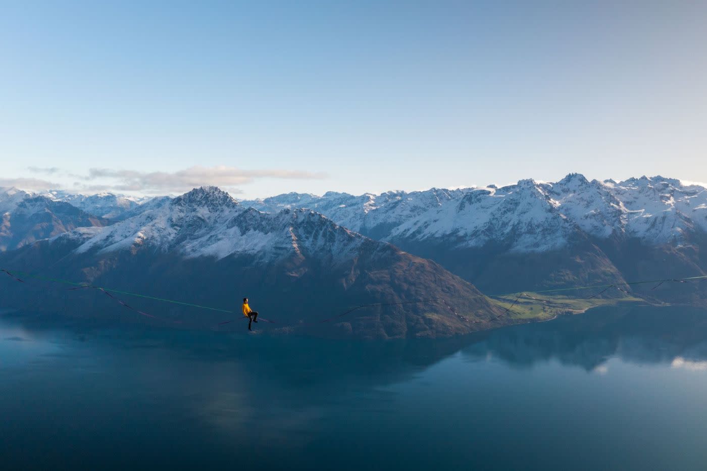 Highliner walks on rope suspended above Lake Whakatipu in Queenstown