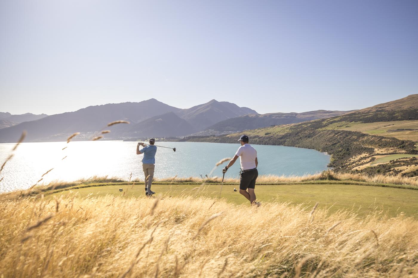 Friends golfing at Jacks Point Course in Summer