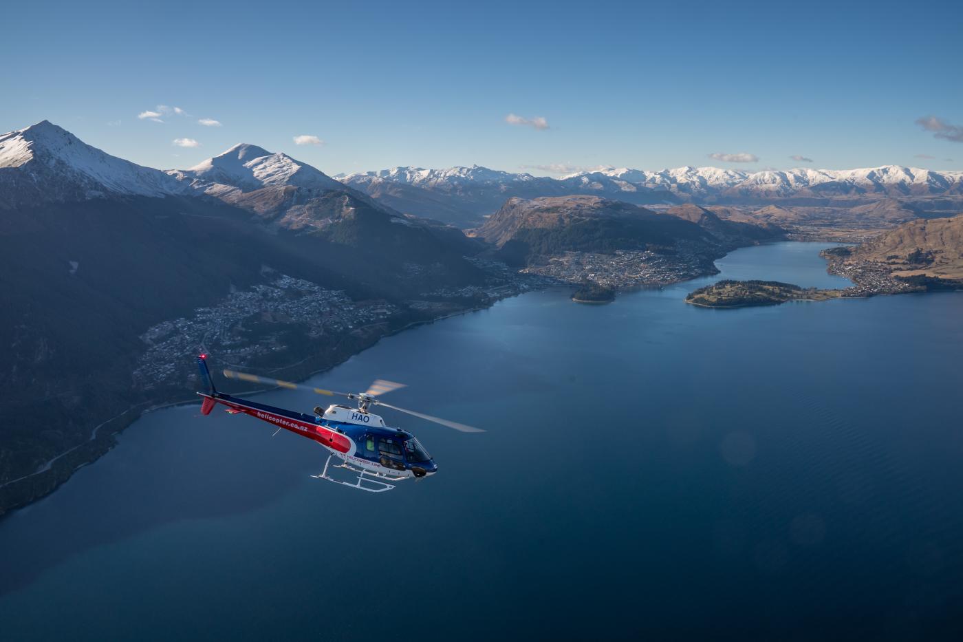 Scenic Heli Flight over Queenstown with views of snow-capped mountains and lake