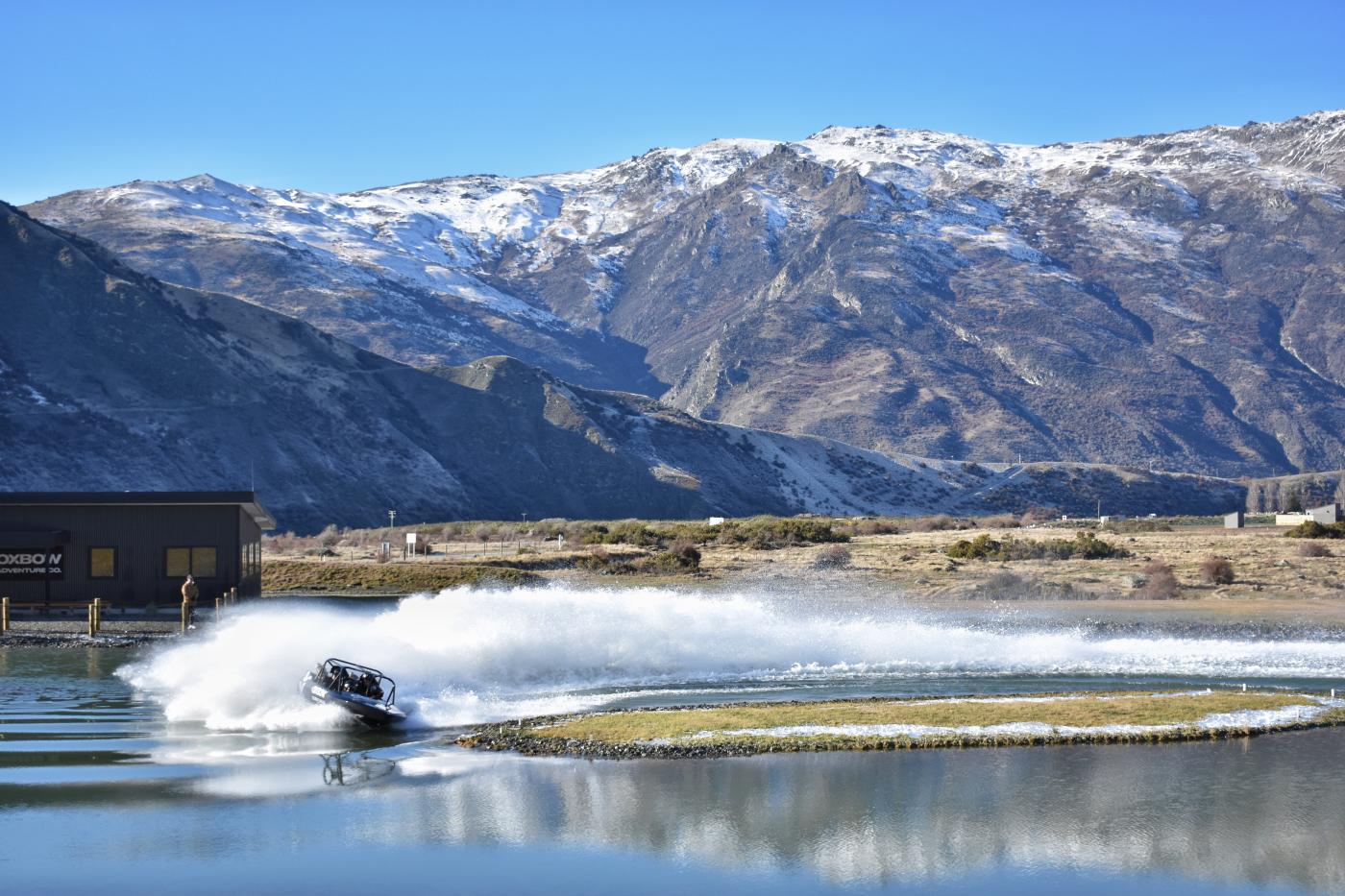 Jet Sprints at Oxbow Adventure Co. under snowwy mountains