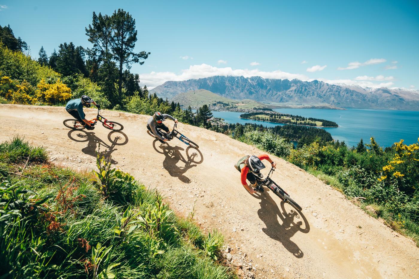 Three friends riding Skyline Queenstown Bike Park