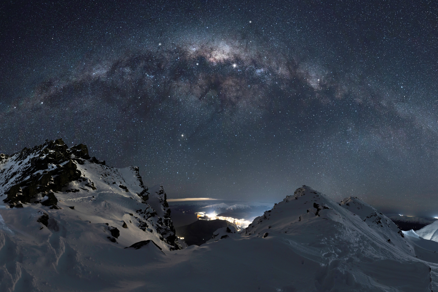 Astrophotography of the milky way above The Remarkables mountain range in Queenstown
