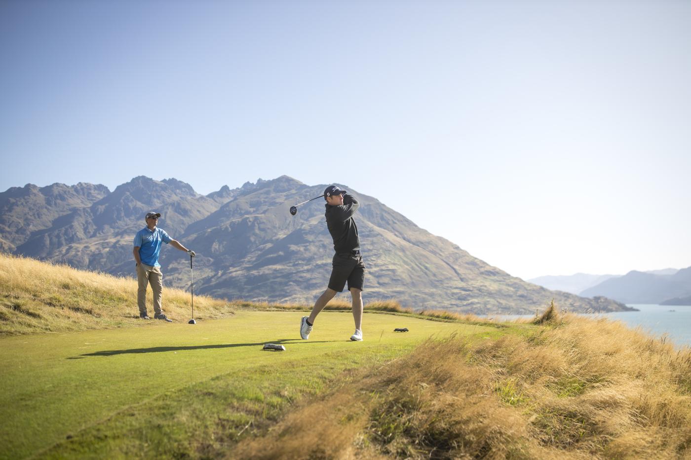 Golfers Playing at Jack's Point in Summer