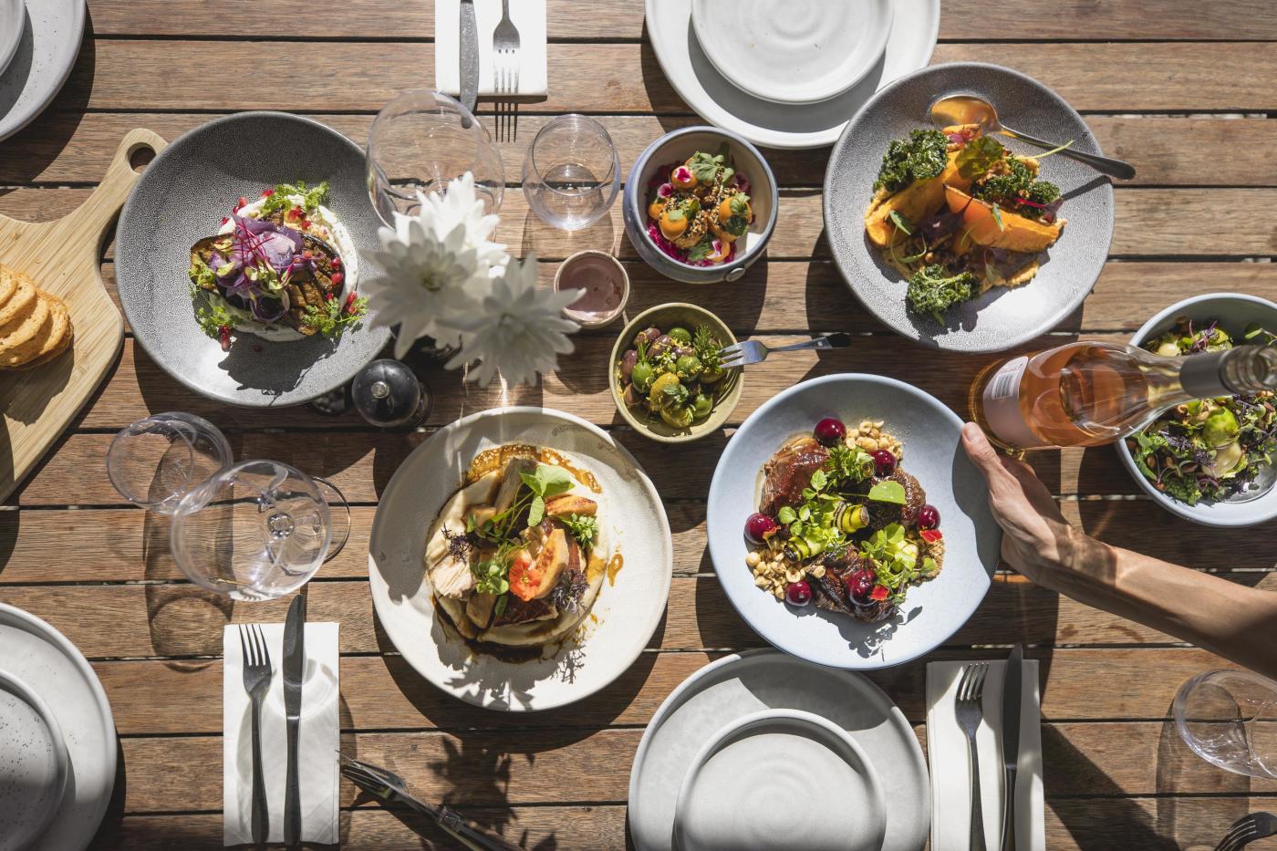 Top view of a selections of colourful lunch dishes