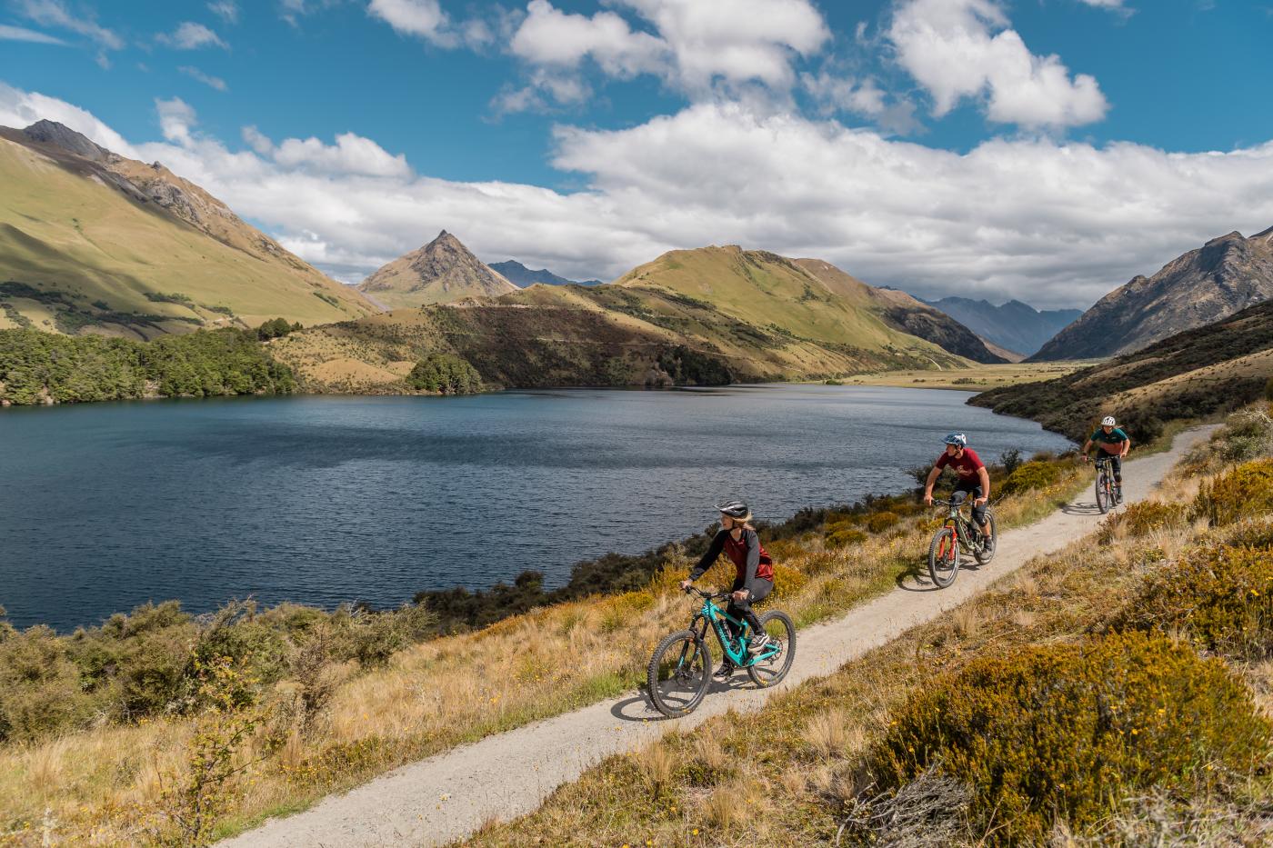 Friends mountain biking around Moke Lake