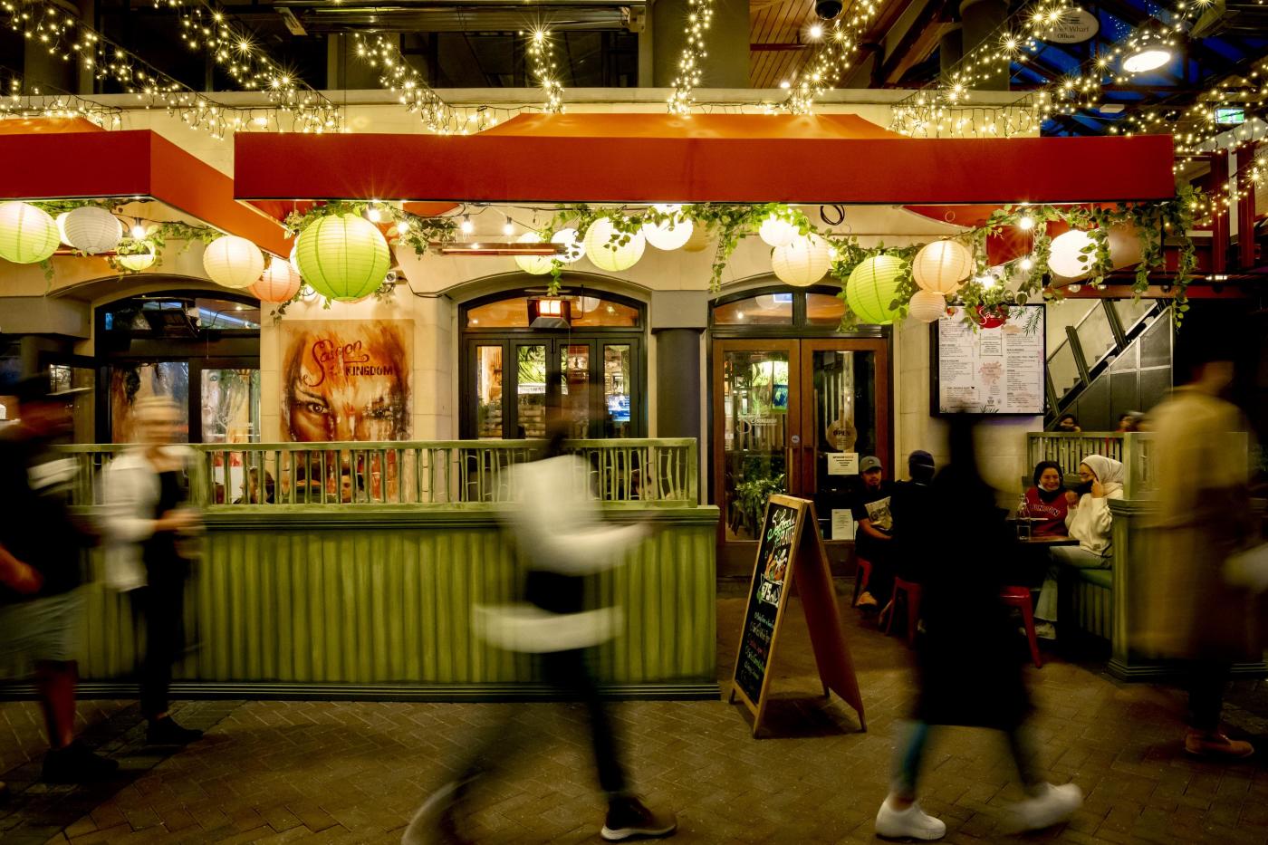 Outside view of Saigon Kingdom, with fairy lights and colourful lanterns