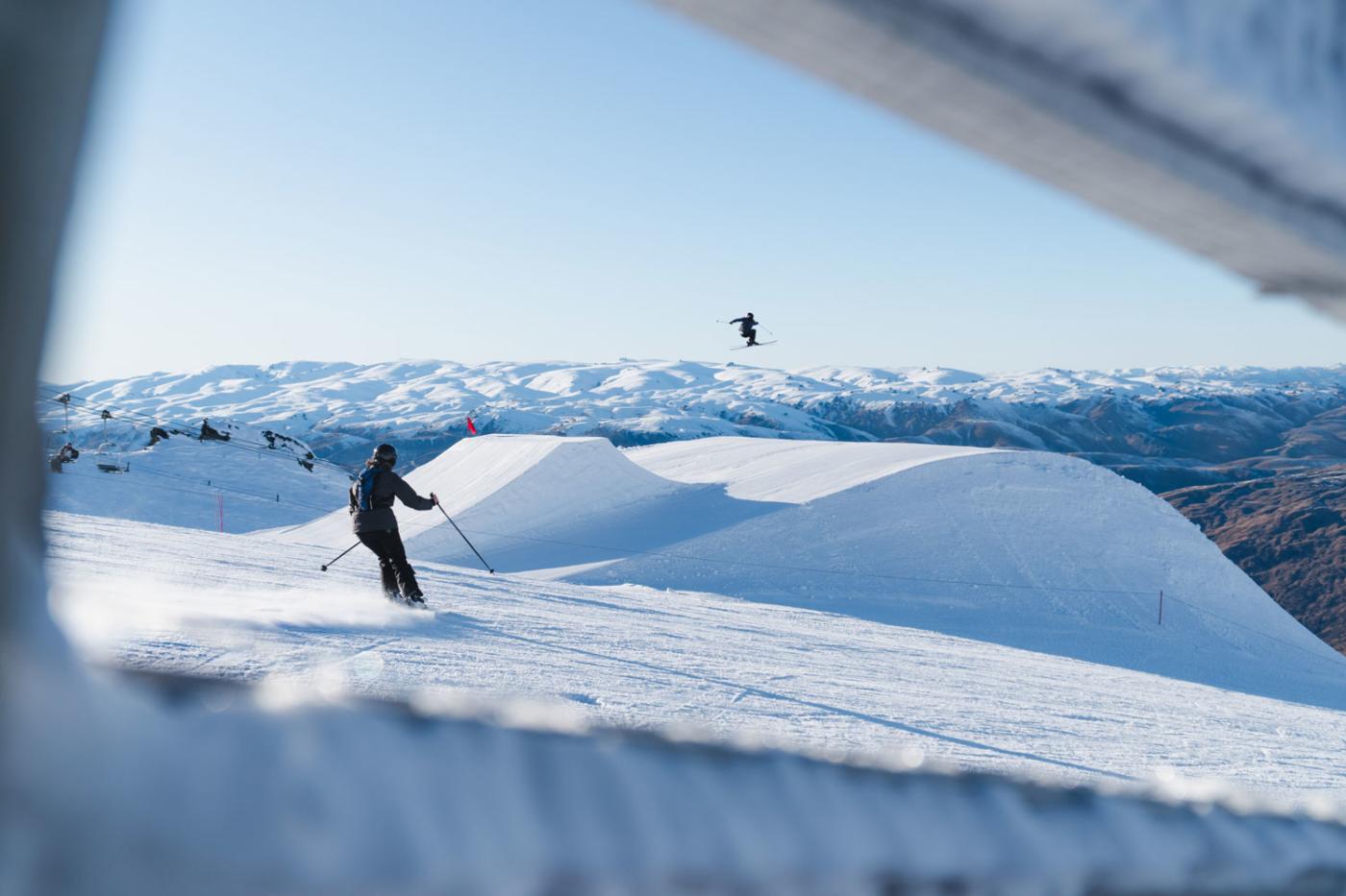 Skier going over a jump