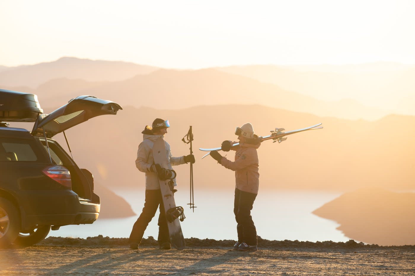 Friends unpack their car for a day of skiing at Treble Cone