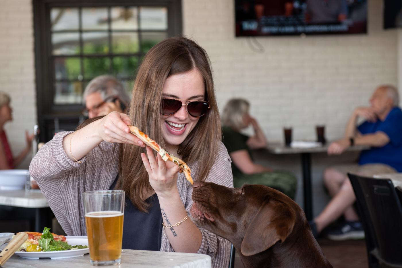 Vintage Pizzeria Dog Day Woman Feeding Dog Pizza