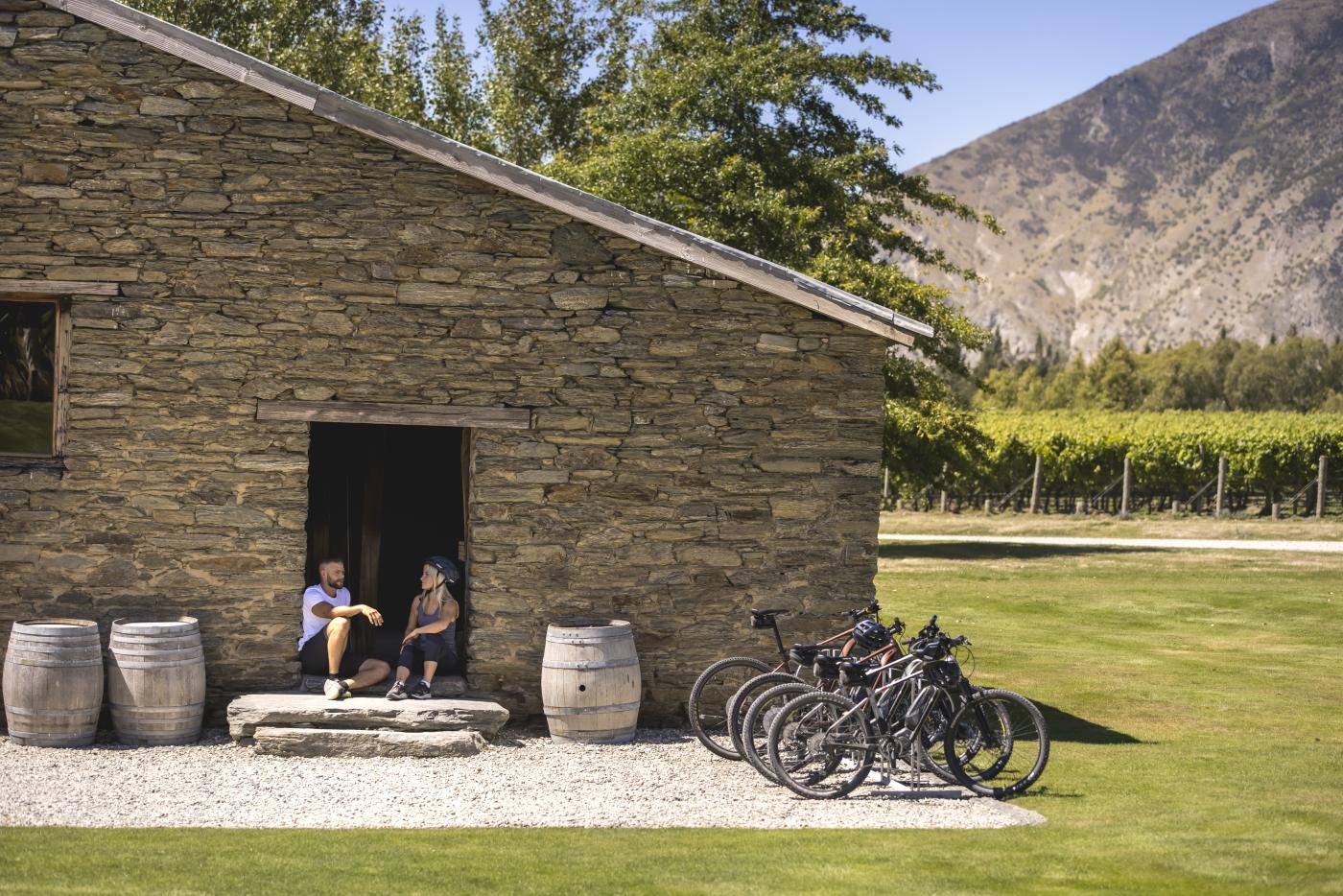 Couple with bikes at Peregrine Winery