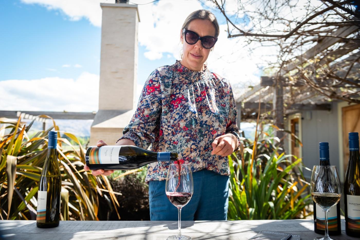 Sommelier pouring wine at Dunstan Road Wines, Central Otago
