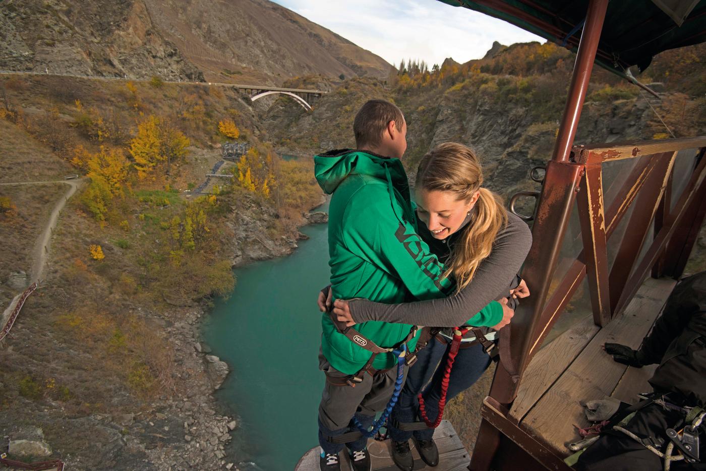 Couple jumping at the Kawarau Bungy in Autumn