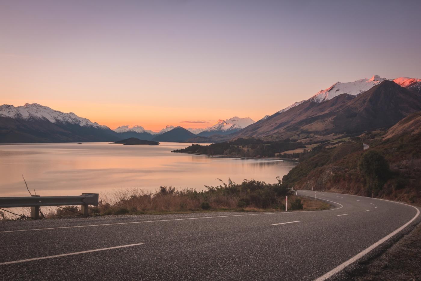 Sunset on Bennett Bluff overlooking snowcapped mountains on the road to Glenorchy