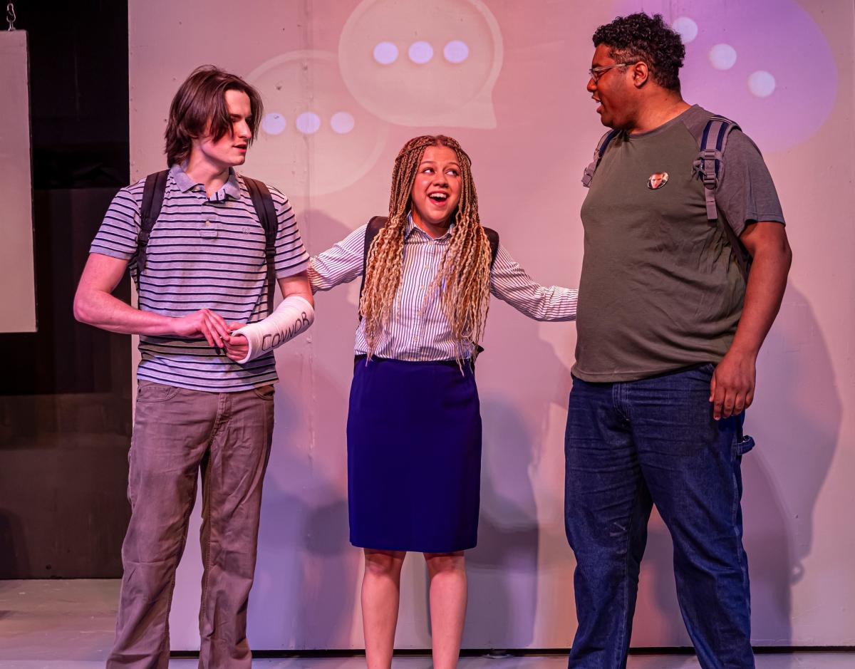 Three cast members perform at Roxy's Downtown in scene of Dear Evan Hansen.