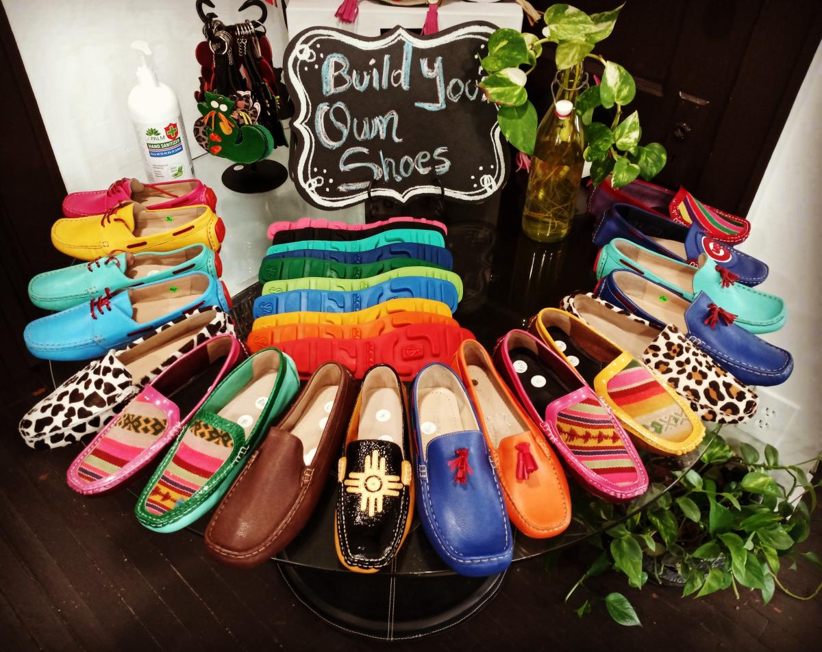 Vibrant shoes sit on display for sale at Aida Stenholm shoe store