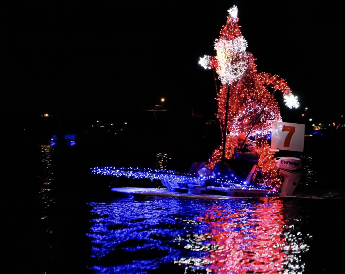 Santa on a Surfboard boat entry for the NC Holiday Flotilla.