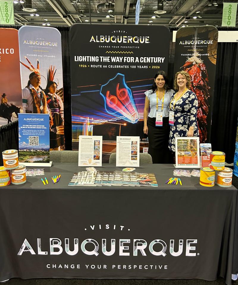 Brenna Moore and Nikki Baca at the Visit Albuquerque booth at the National Tour Association Travel Exchange.