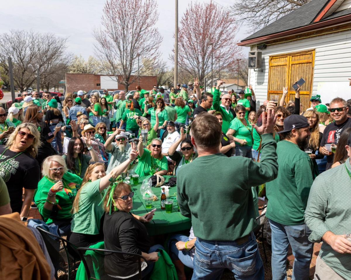 People party in Delano while wearing green during a St. Patrick's Day Party