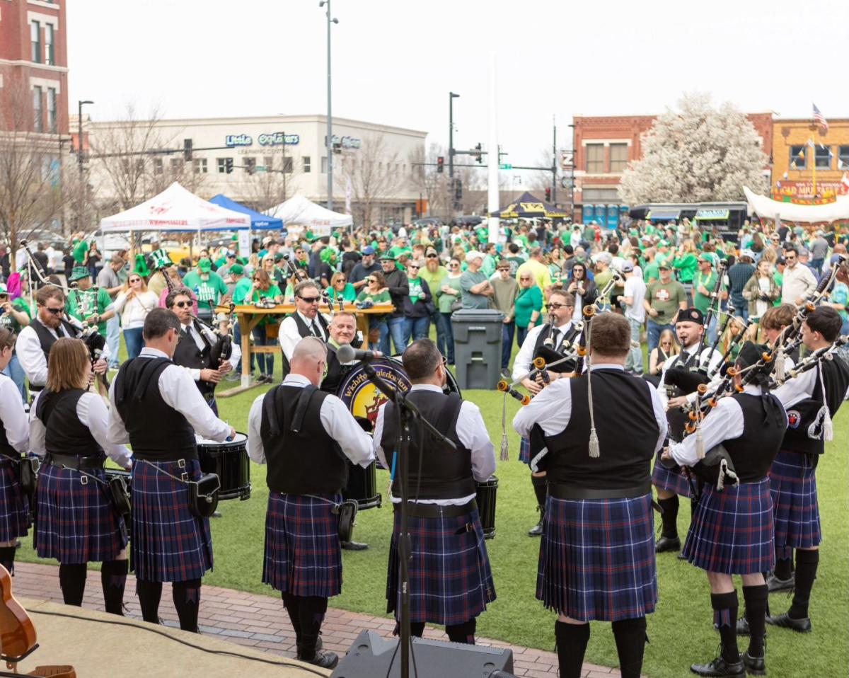 People party during a St. patrick's Day event at Naftzger Park