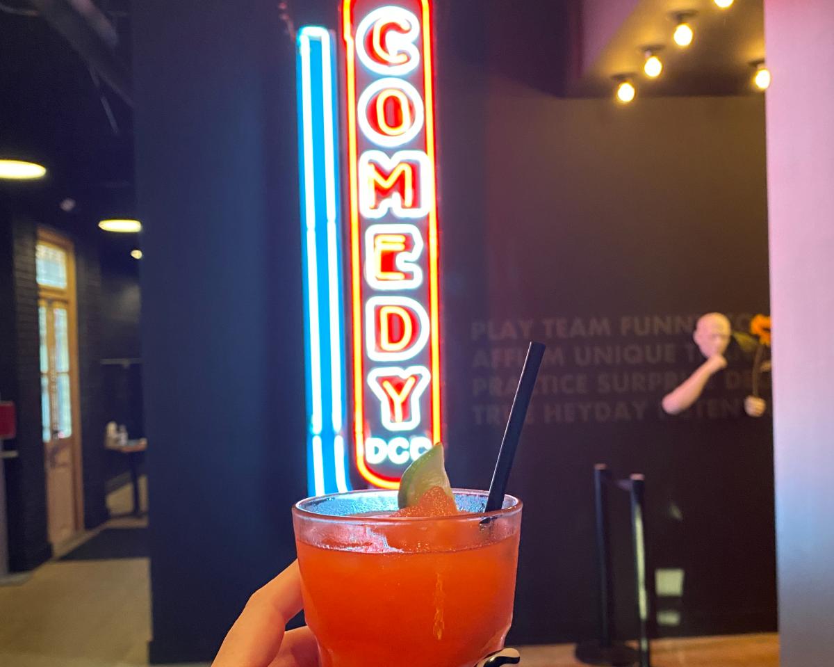 neon sign and drink at Dallas Comedy Club