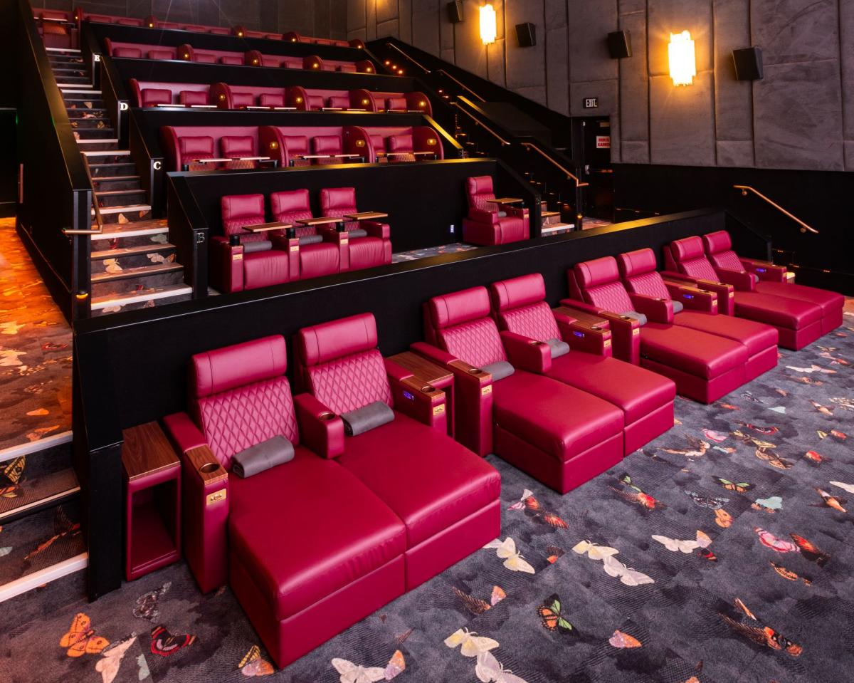 Red lounge seats at Reel Luxury Cinemas, located in Market Street in The Woodlands, Texas
