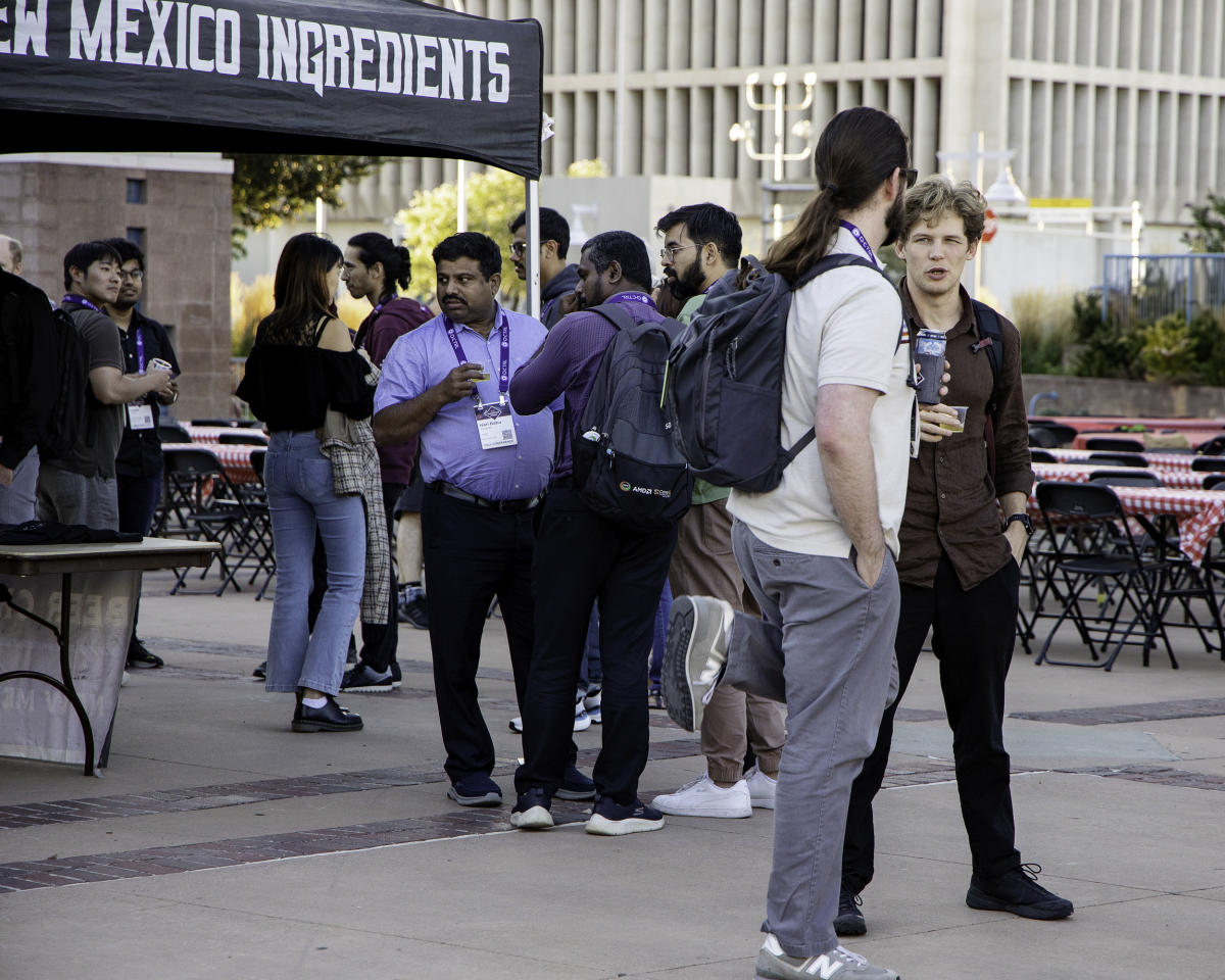 IEEE Quantum Week attendees go to an event on Civic Plaza.