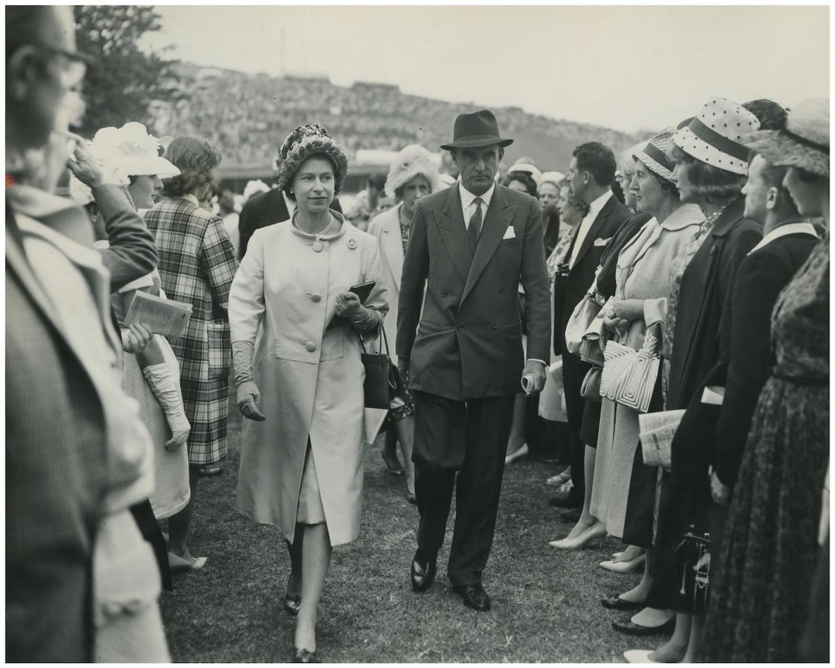 The Queen visiting Goodwood Racecourse in 1961, accompanied by the 9th Duke of Richmond