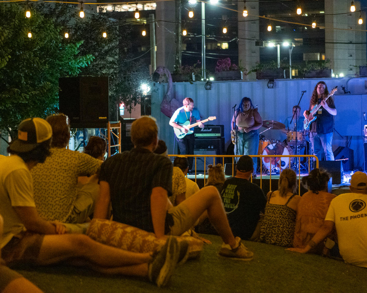 Crowd watches band play during music festival in Wichita, KS