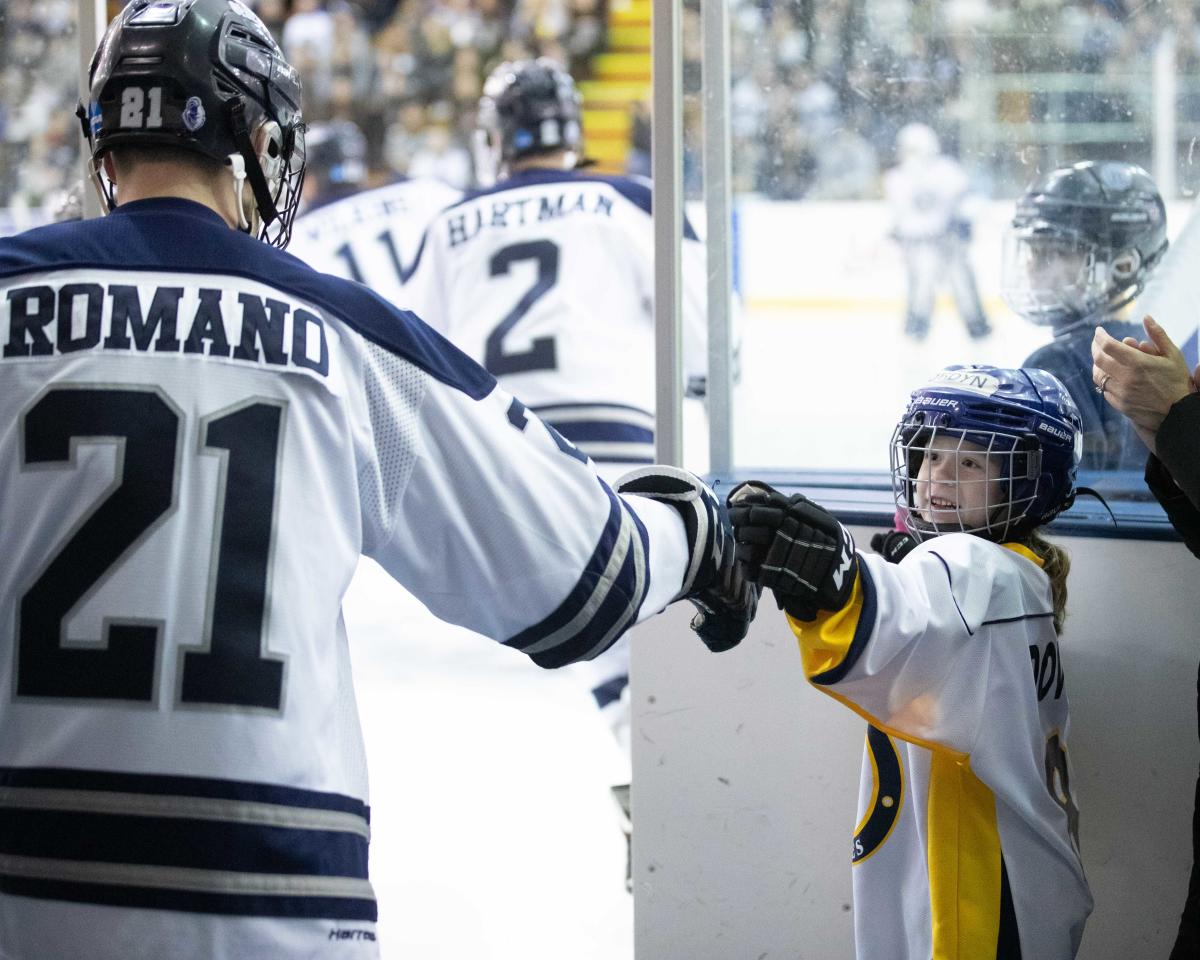 Hockey Player and Fan