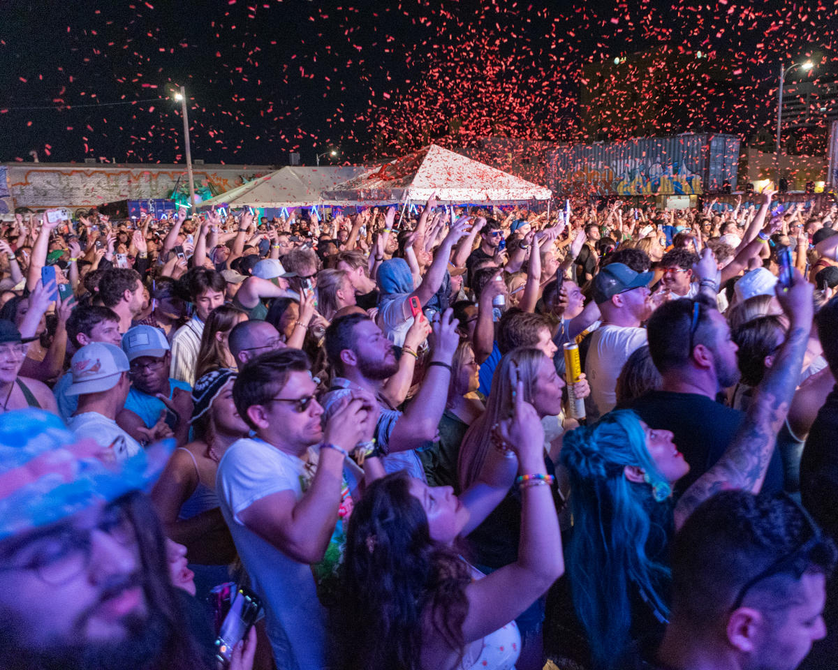 A crowd cheers during an Elsewhere fest concert at WAVE