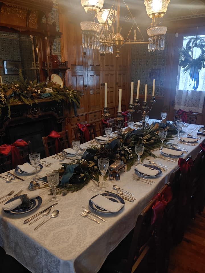 Dining table at Whaley House Historic Museum decorated for a 19th Century Christmas.