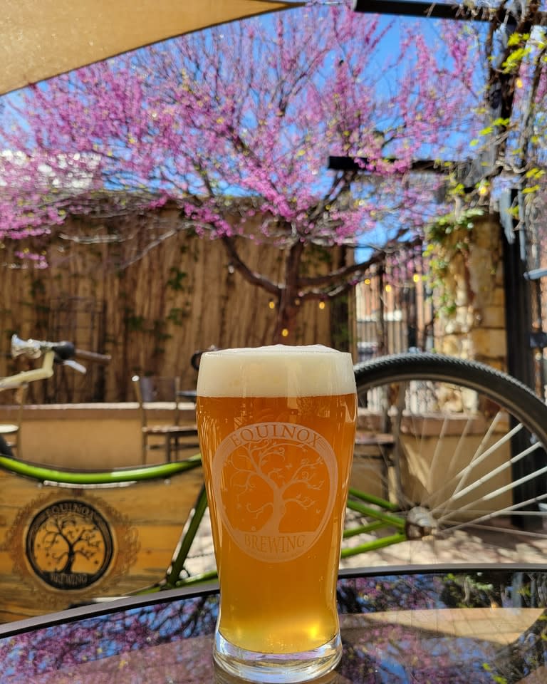 A beer on the outdoor patio at Equinox Brewing Company