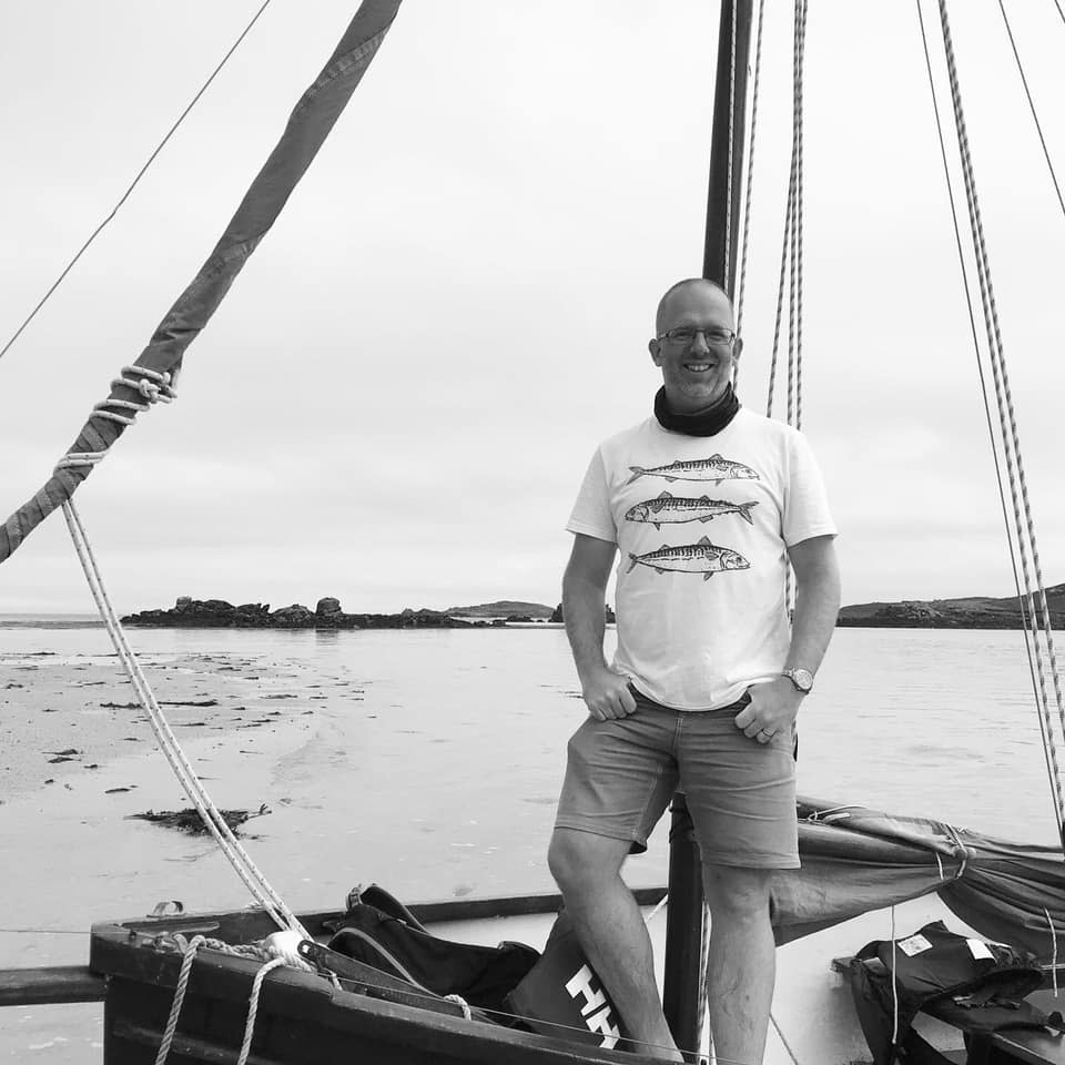 Wyl Menmuir on a boat
