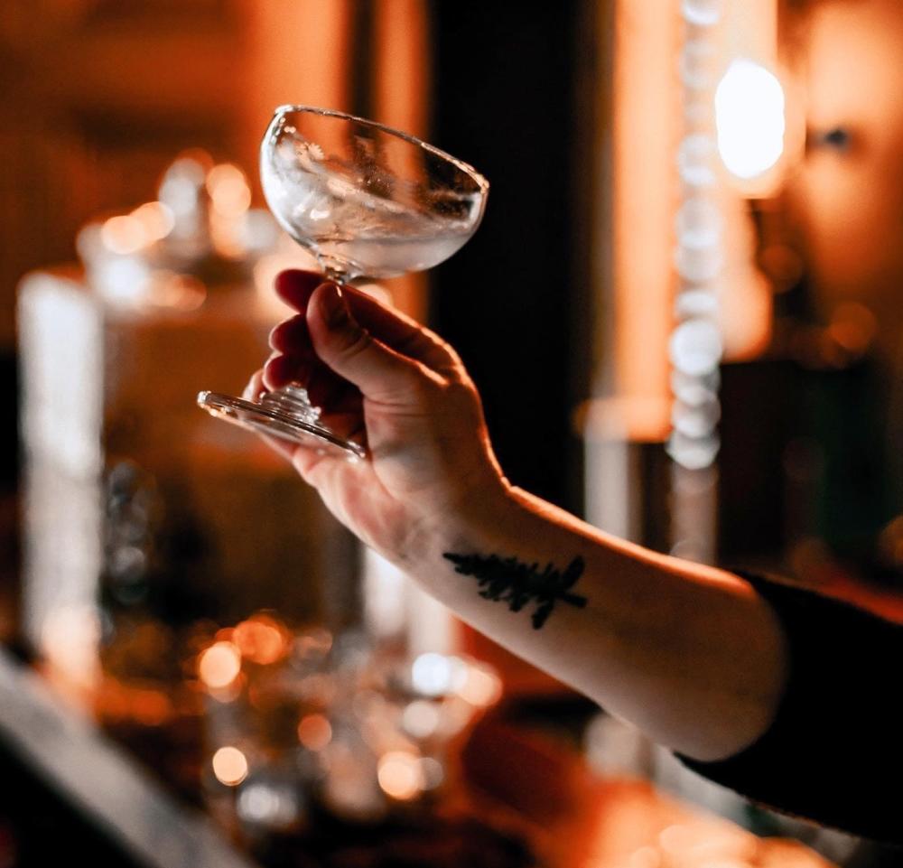 Bartender holding a martini glass