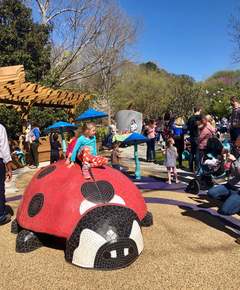Children playing in a playground at the Children's Garden in Athens, GA
