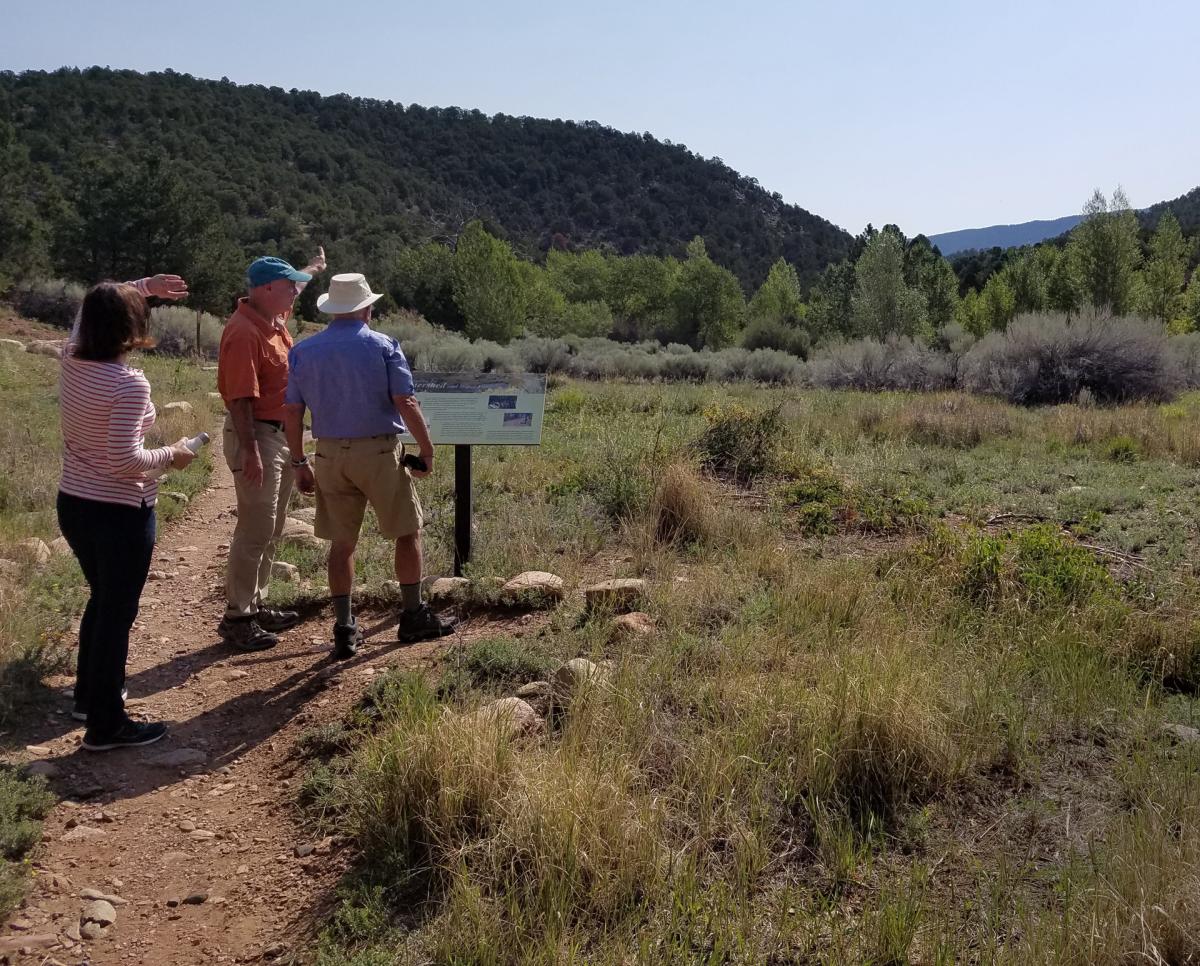 Terry Sullivan takes outdoor enthusiasts on a hike in the Santa Fe Canyon Preserve, New Mexico Magazine