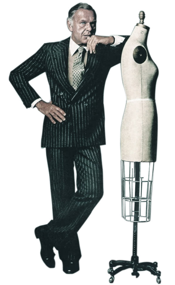 Bill Blass posing with dress form