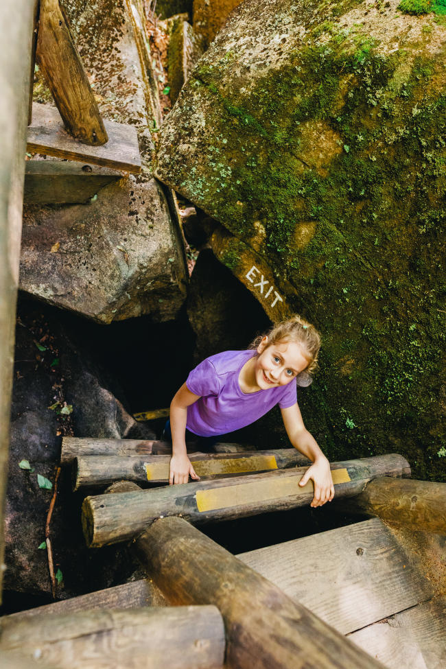 Lost River Gorge (girl climbing ladder out of cave)