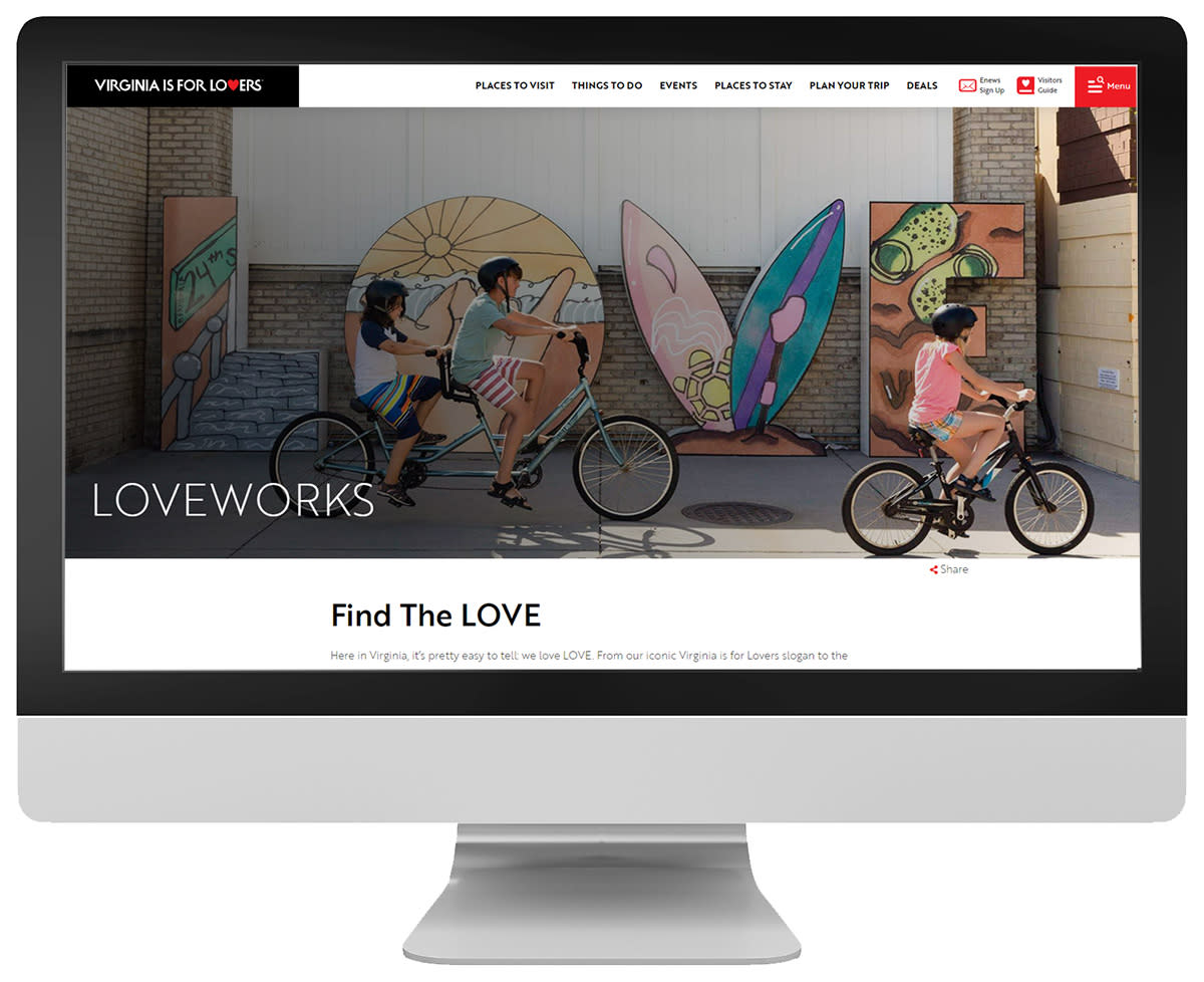 Virginia is for Lovers homepage with children riding bicycles in front of large letters spelling out Love