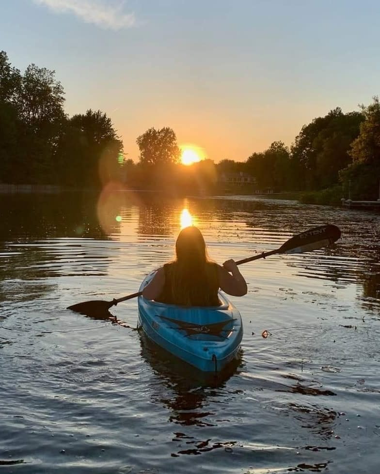 Beth Kayaking into the sunset