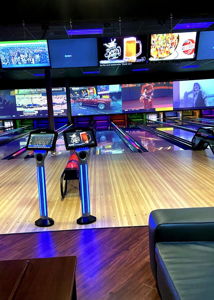 Bowling lanes and big screen TVs at the Fourth Dimension Fun Center in Frederick, MD