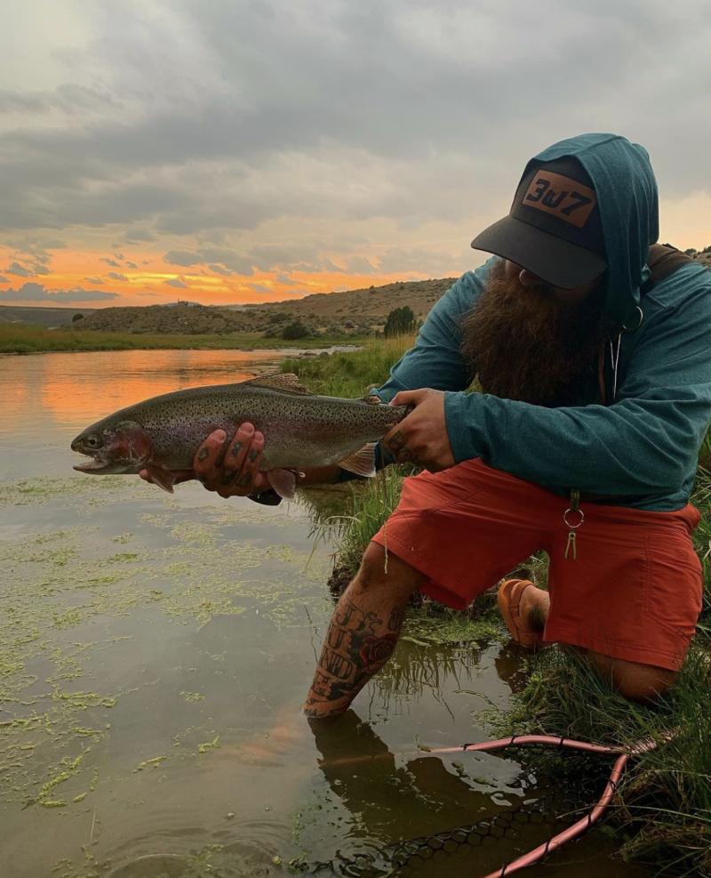 A man holding a large fish at the North Platte River