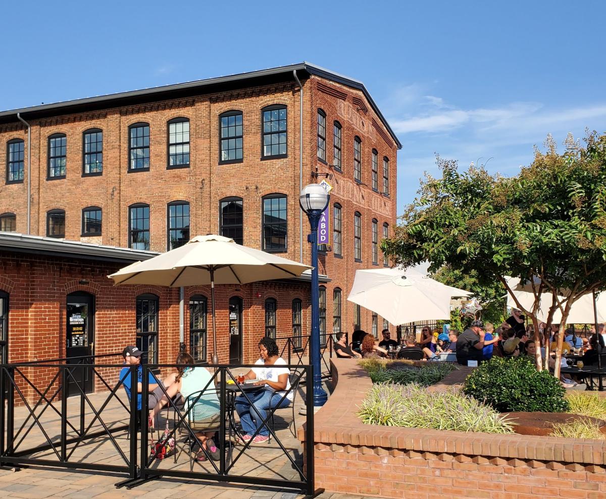 Woman on the patio at Idiom Brewing Company