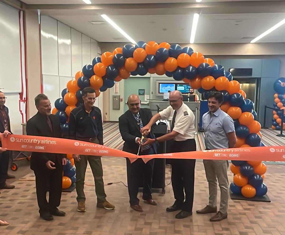 A ribbon cutting for the inaugural Sun Country flight to and from the Sunport.