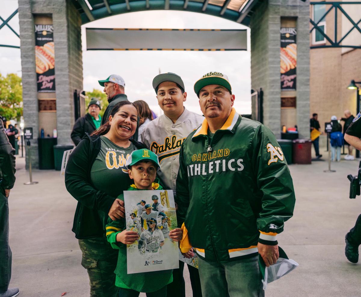 Family of four at an Athletics game in Sacramento