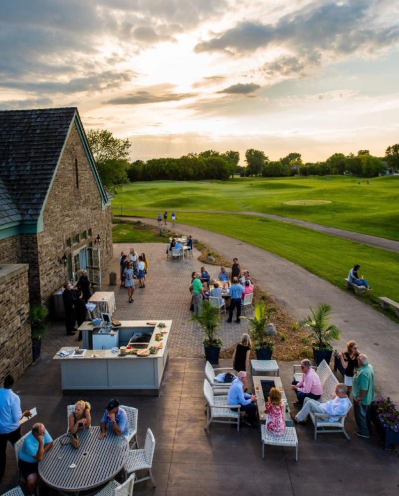 Sunset over the patio of The Brooklyn Restaurant at Edinburgh USA Golf Club