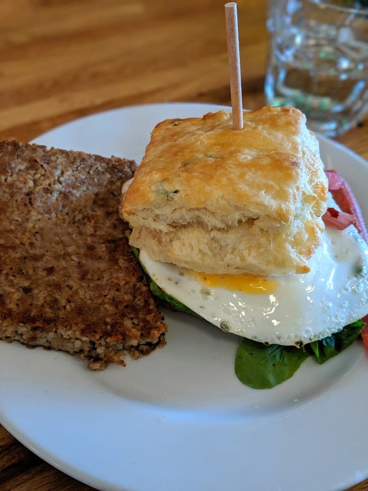 image of goetta and an egg sandwich on a plate served at the baker's table in newport kentucky